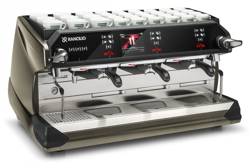 This image is a front-side view of the Rancilio Classe 11 Xcelsius tall in frozen bronze, 3 groups with a higher group area and volumetric dosing controls.