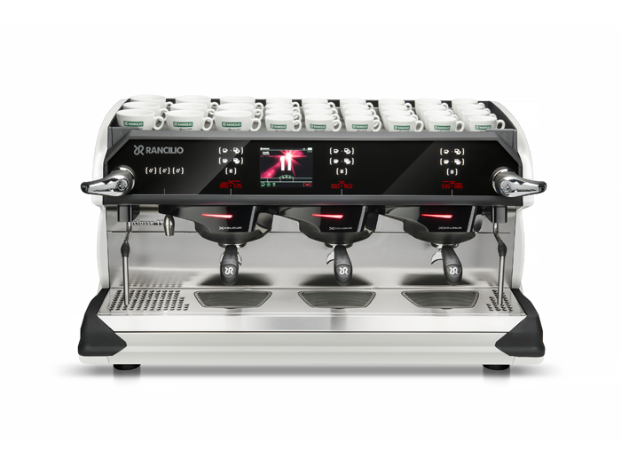 This image is a front view of the Rancilio Classe 11 Xcelsius in pearl white, 3 groups at traditional height and volumetric dosing controls.